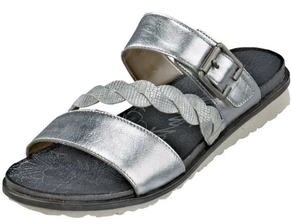 Modische Pantolette mit Klettverschluss. Zierschließe und Band mit Flechtoptik